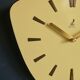 Vintage formica clock asymmetrical silent wall clock "Golden yellow Jaz"