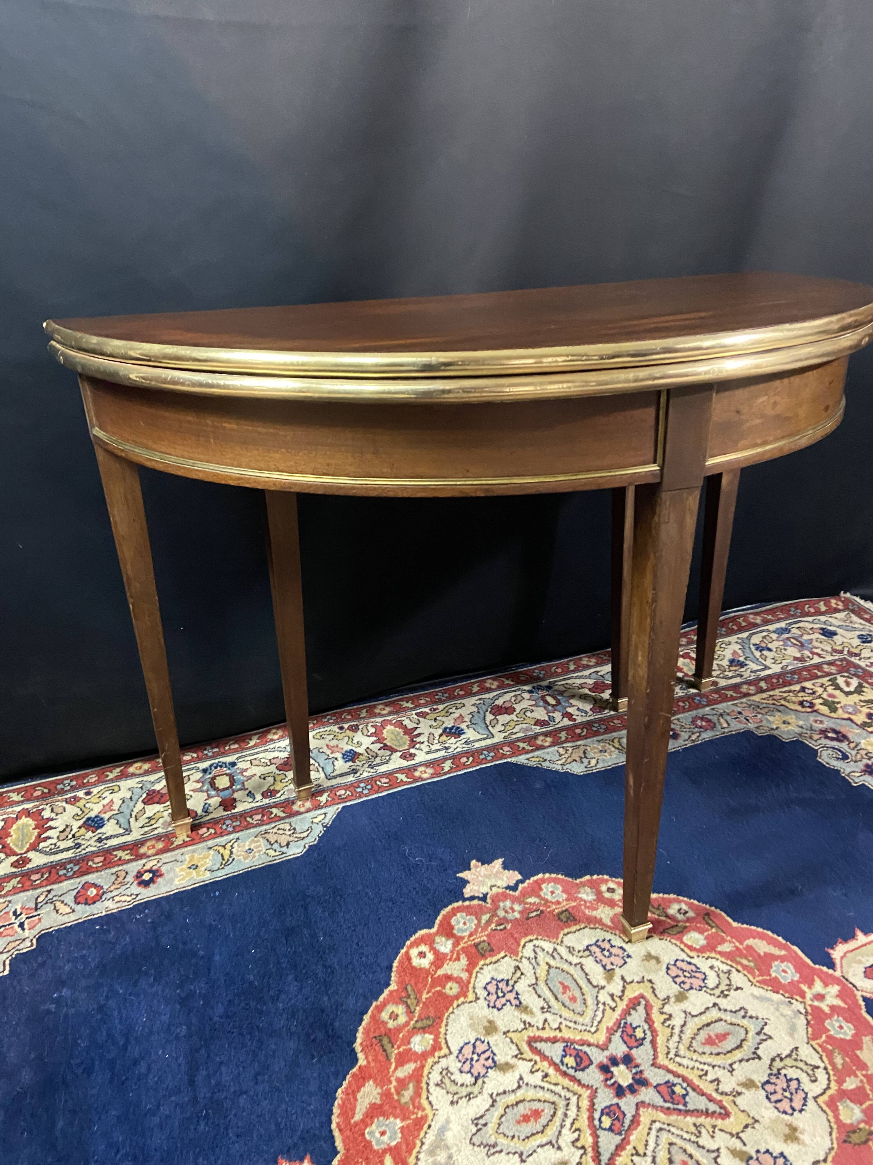 Console table demi-lune 19th century Louis XVI modular foldable top in mahogany.