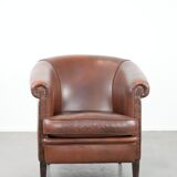 Cognac-coloured cow leather club armchair in English style