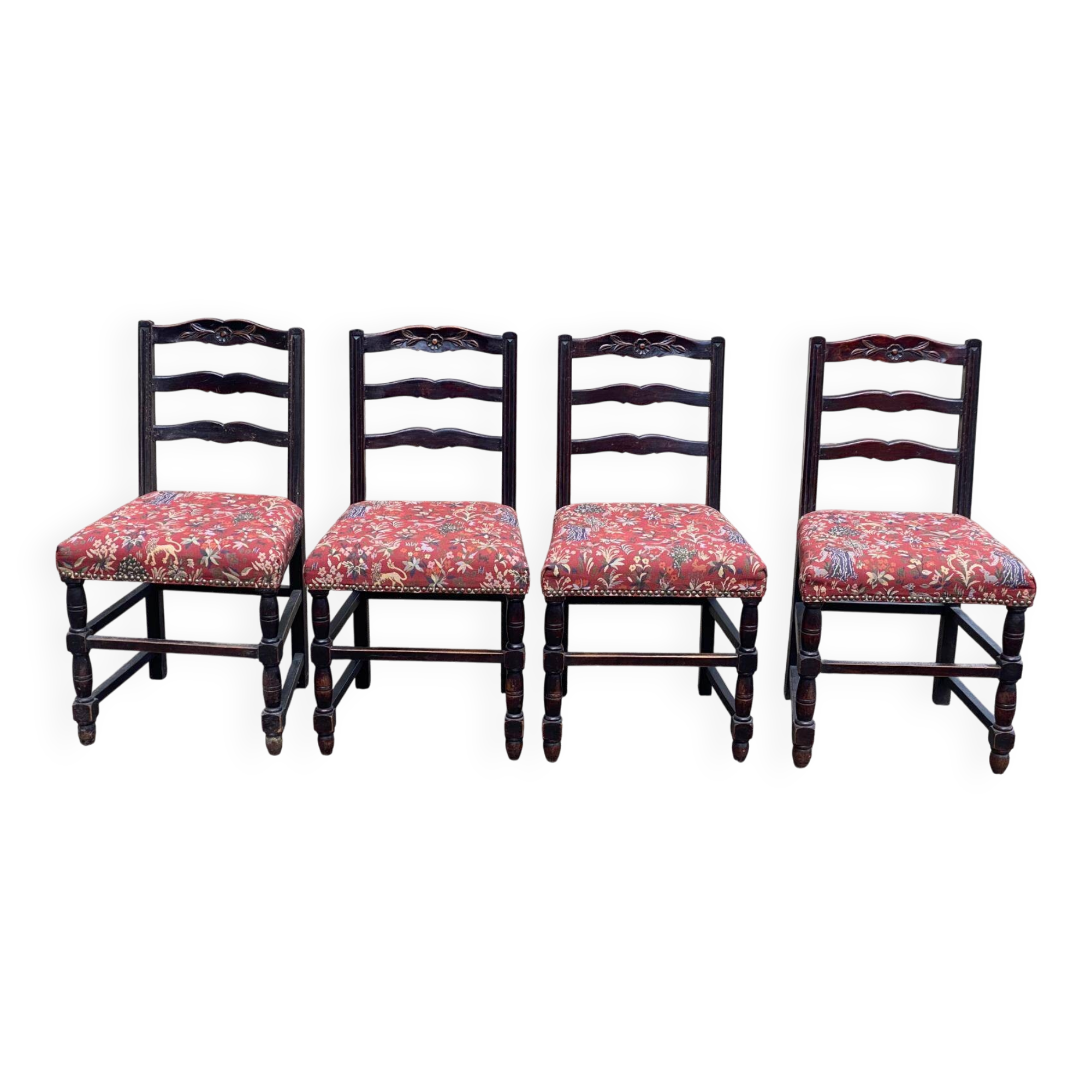 4 Henri II chairs in solid wood and floral burgundy fabric from the 19th century.