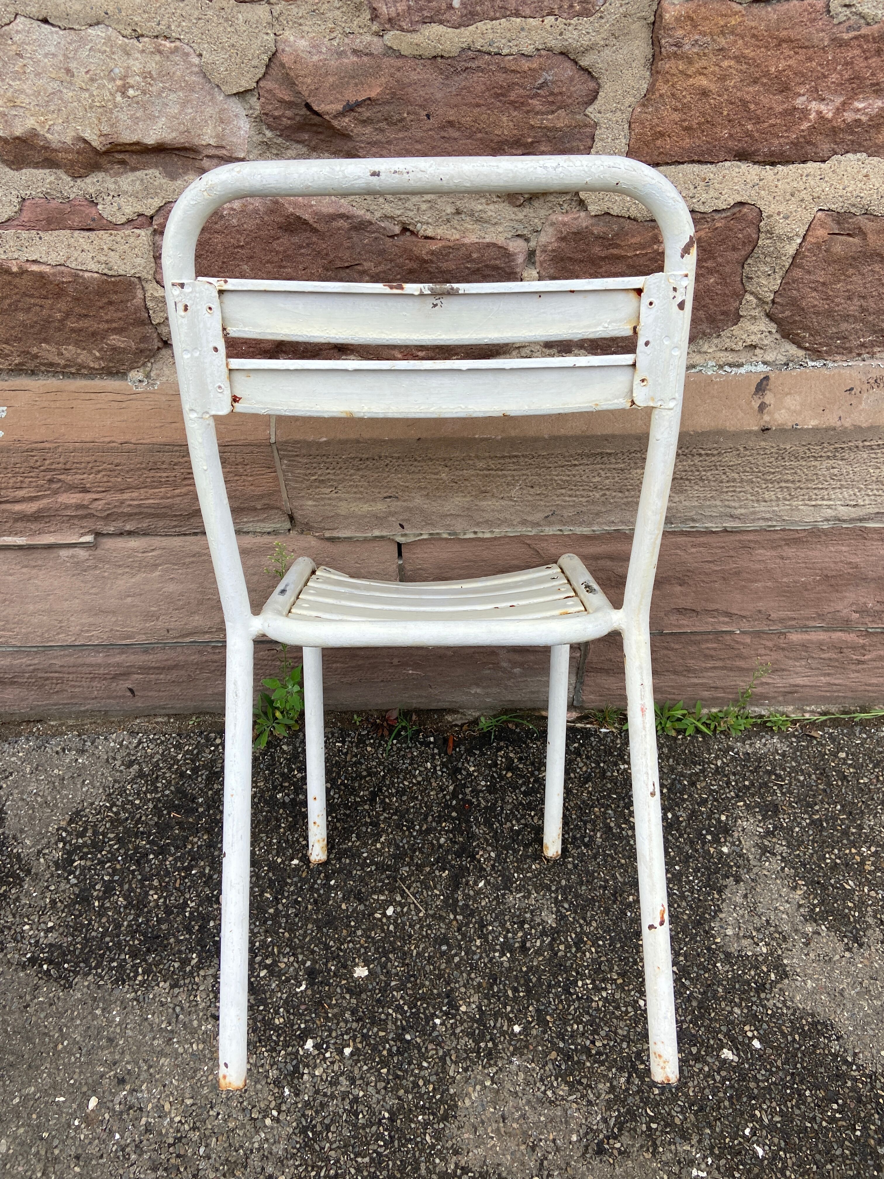 2 chairs Tolix T2 Xavier Pauchard French bistrot chairs Paris Garden terrace 50s