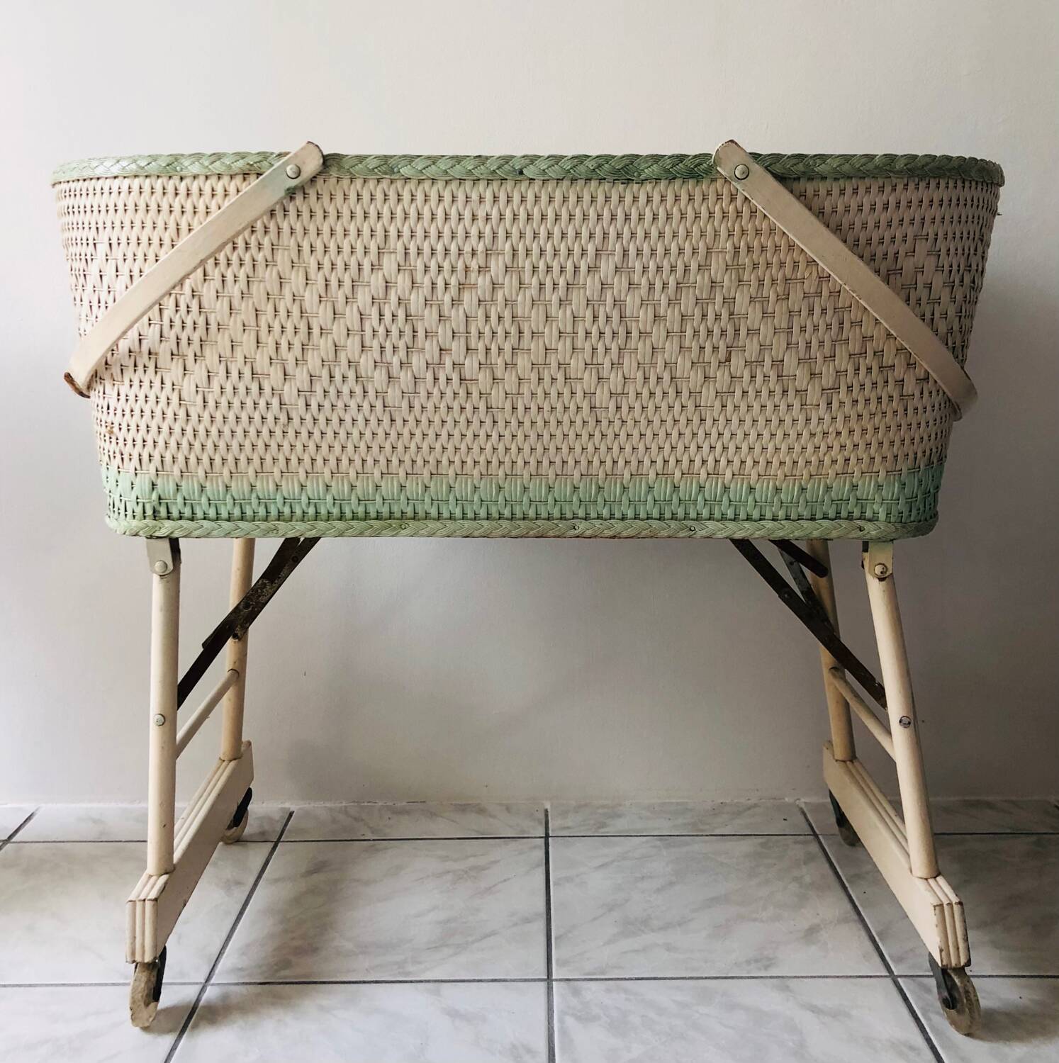 Wood and wicker cradle from the 1950s.