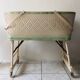 Wood and wicker cradle from the 1950s.