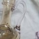 Large Art Nouveau carafe with iridescent enamelled glass and flowers.