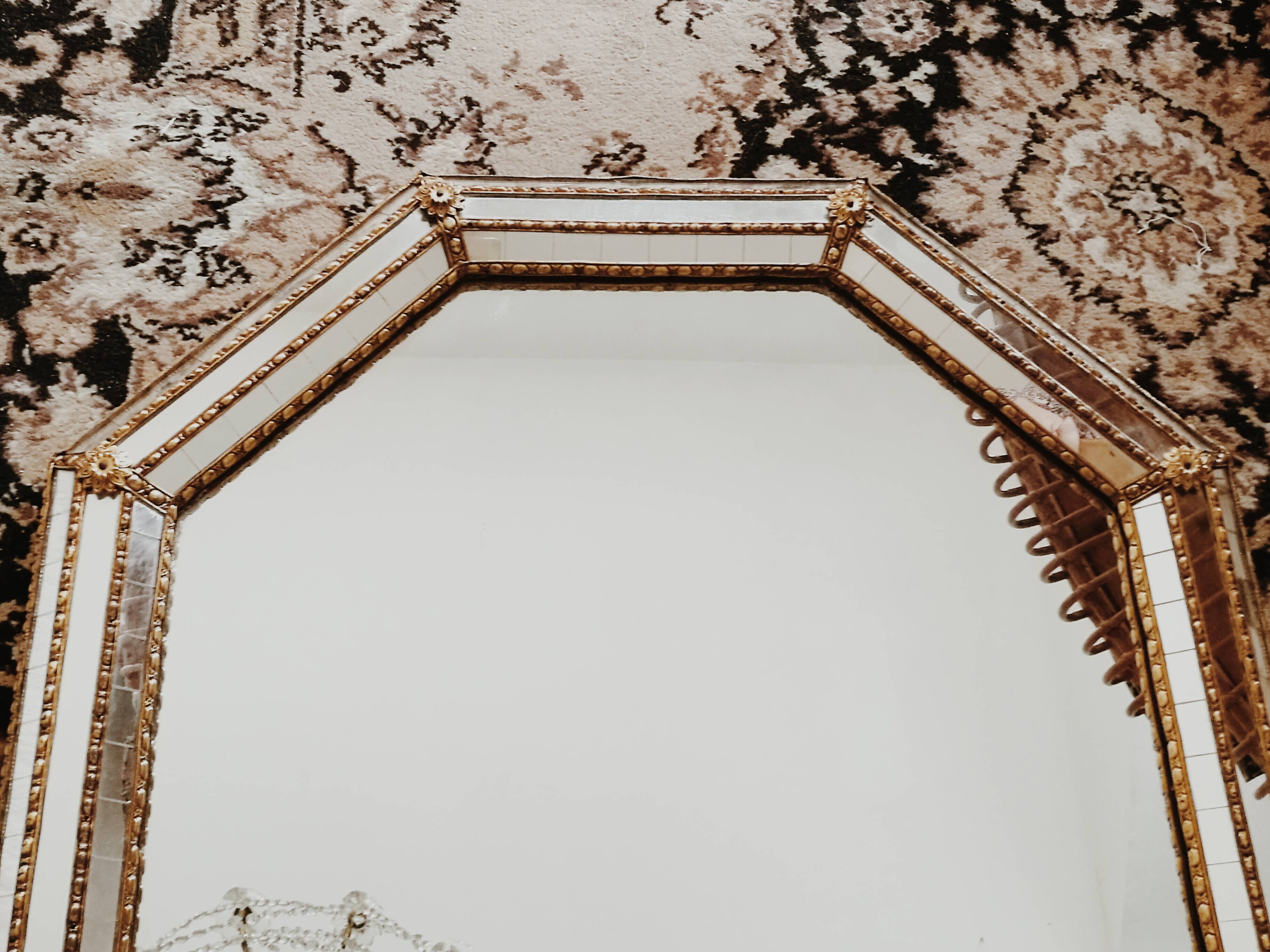 Old mirror with parecloses