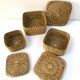 Vintage trio of small rattan nesting baskets