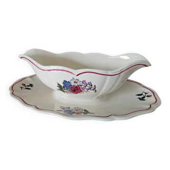 Antique sauce boat in Sarreguemines earthenware.