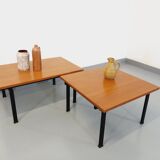 Suite of two vintage modernist Isa coffee tables in teak and black metal from the 60s