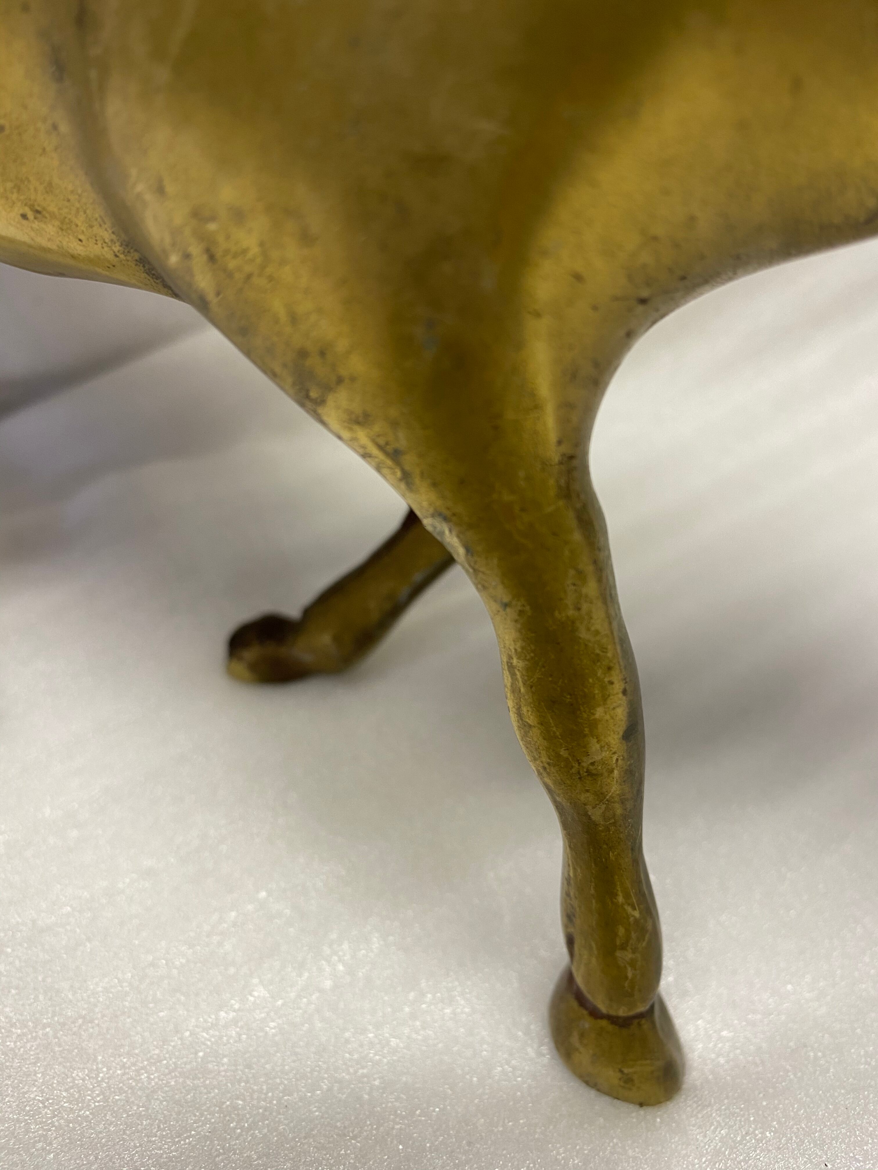 Brass buffalo figure