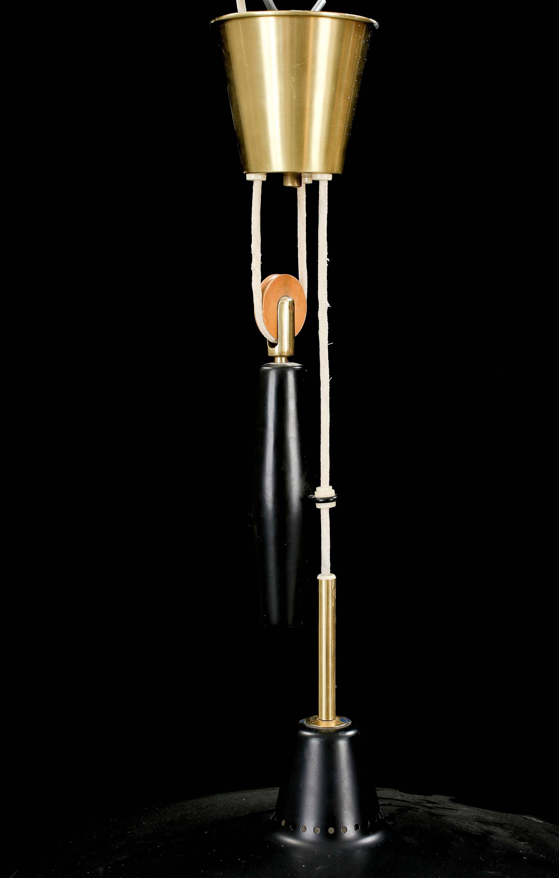 Anonymous suspended lamp with metal black and brass counterweight, Sweden, 1950.