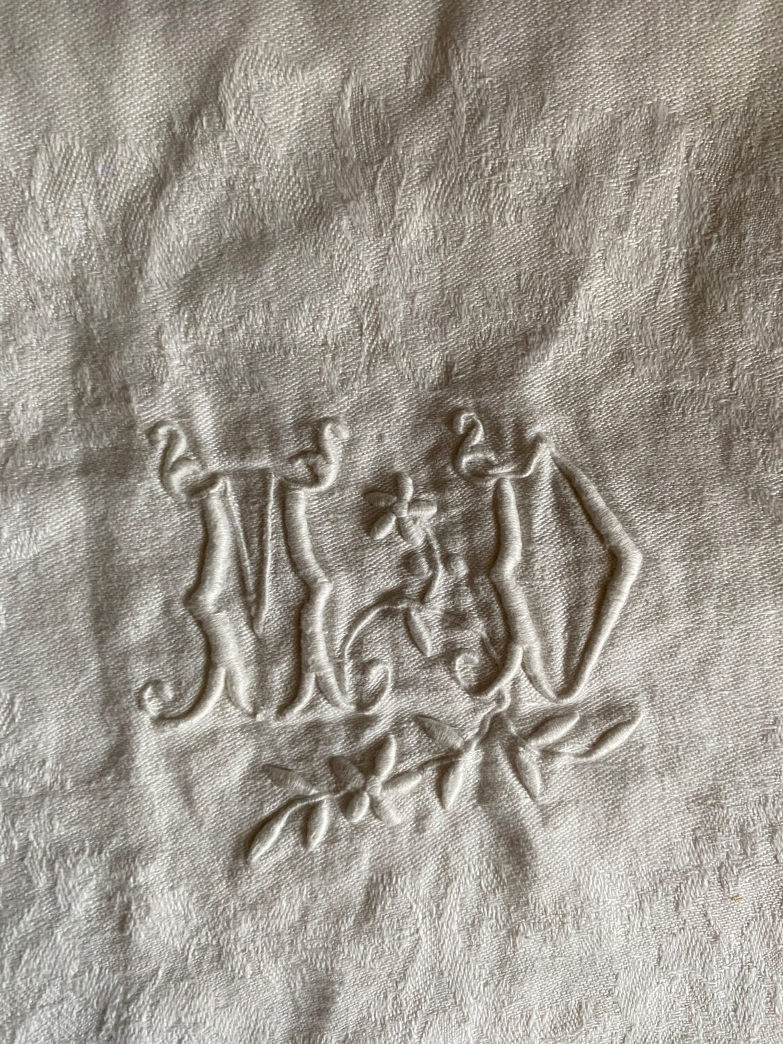 Large white cotton tea towel with damask thread.