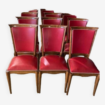 Set of 12 wooden and skai chairs