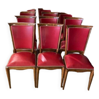 Set of 12 wooden and skai chairs