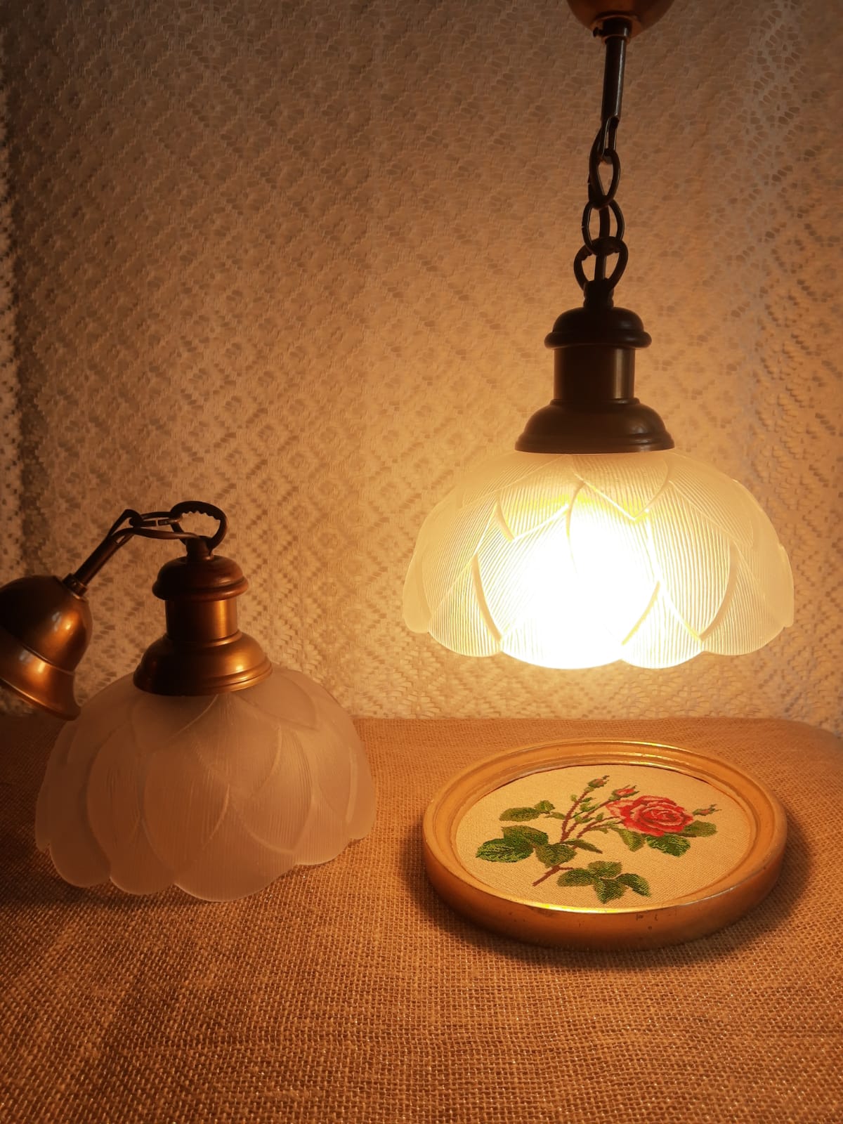 Pair of frosted glass flower pendant lights with vintage wood and brass