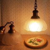 Pair of frosted glass flower pendant lights with vintage wood and brass