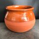 Matt and glazed round earthenware pot