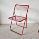 Chaise pliante en métal fil rouge
