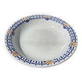 Round, shallow ceramic salad bowl from Saint Amand