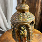 Ceramic lanterns, decorated with religious icons.