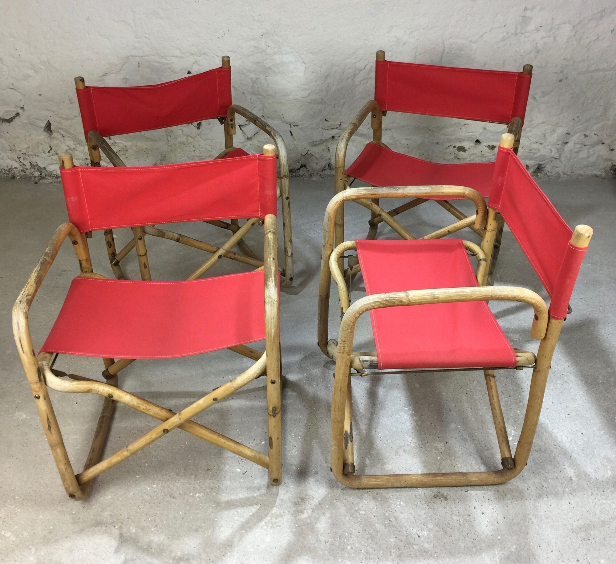 Lot of 4 chairs in rattan and red fabric, folding, 1960s