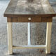 Farm table in solid oak - white patinated legs and its bench.