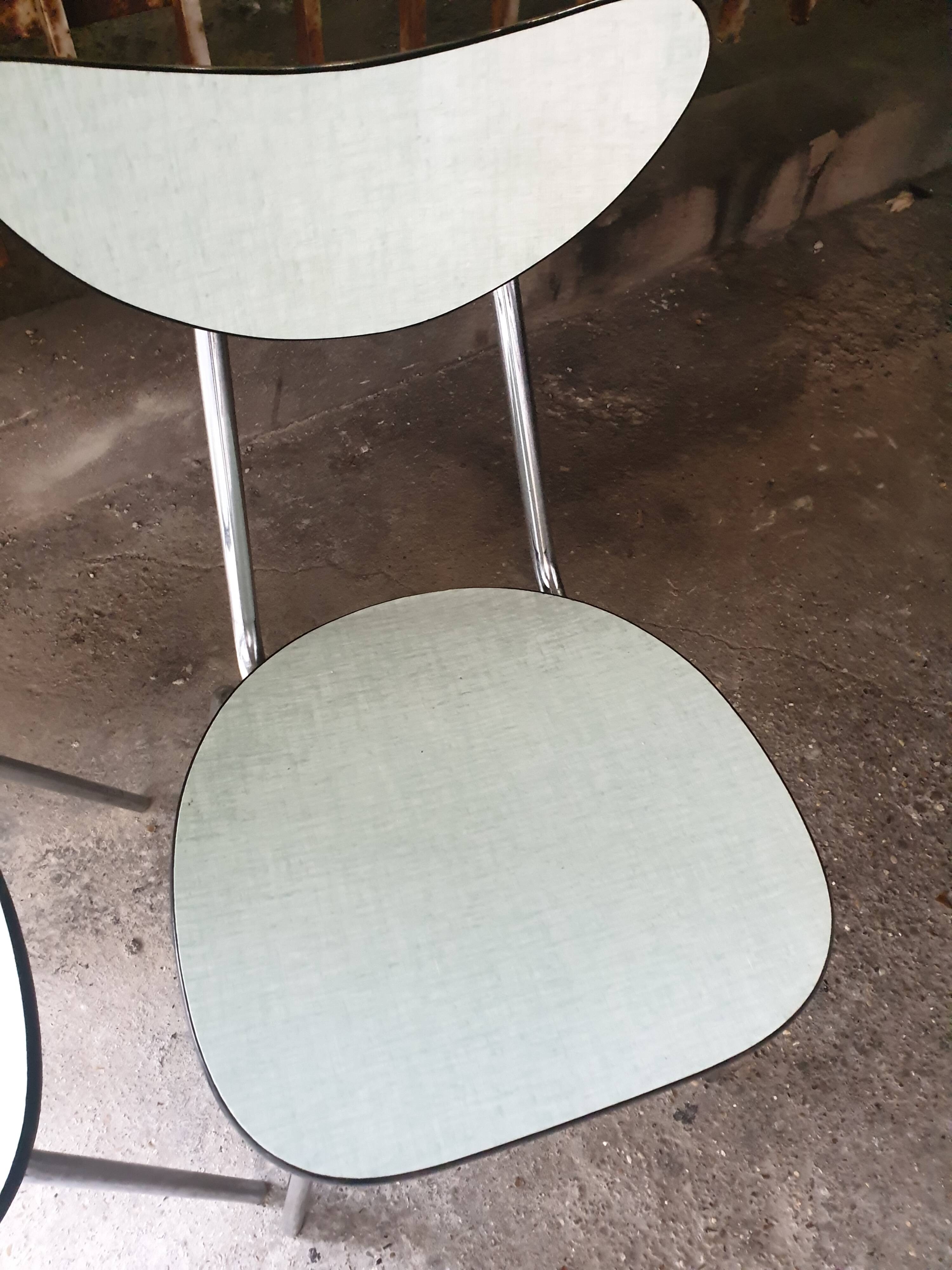 2 seventies water green formica chairs