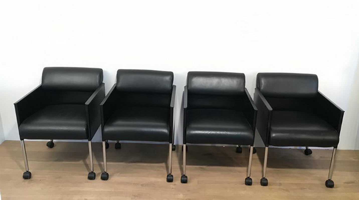 Set of 4 armchairs in leather and black lacquered metal. Rosenthal