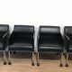Suite de 4 fauteuils en cuir et métal laqué noir. Rosenthal