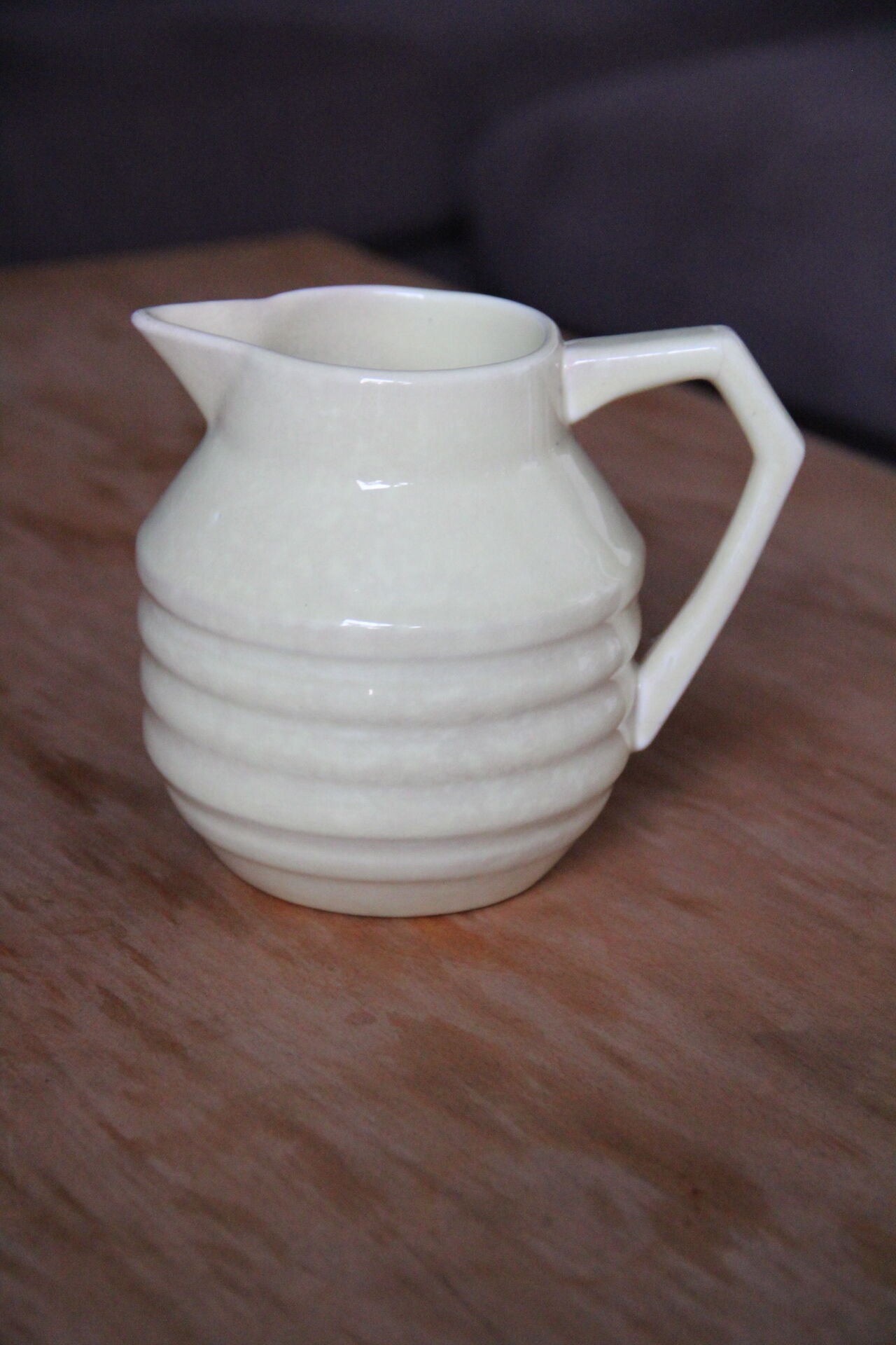 Art-deco pitcher in pale yellow earthenware
