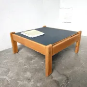 Modernist coffee table in solid pine with a reversible top, 1970s.