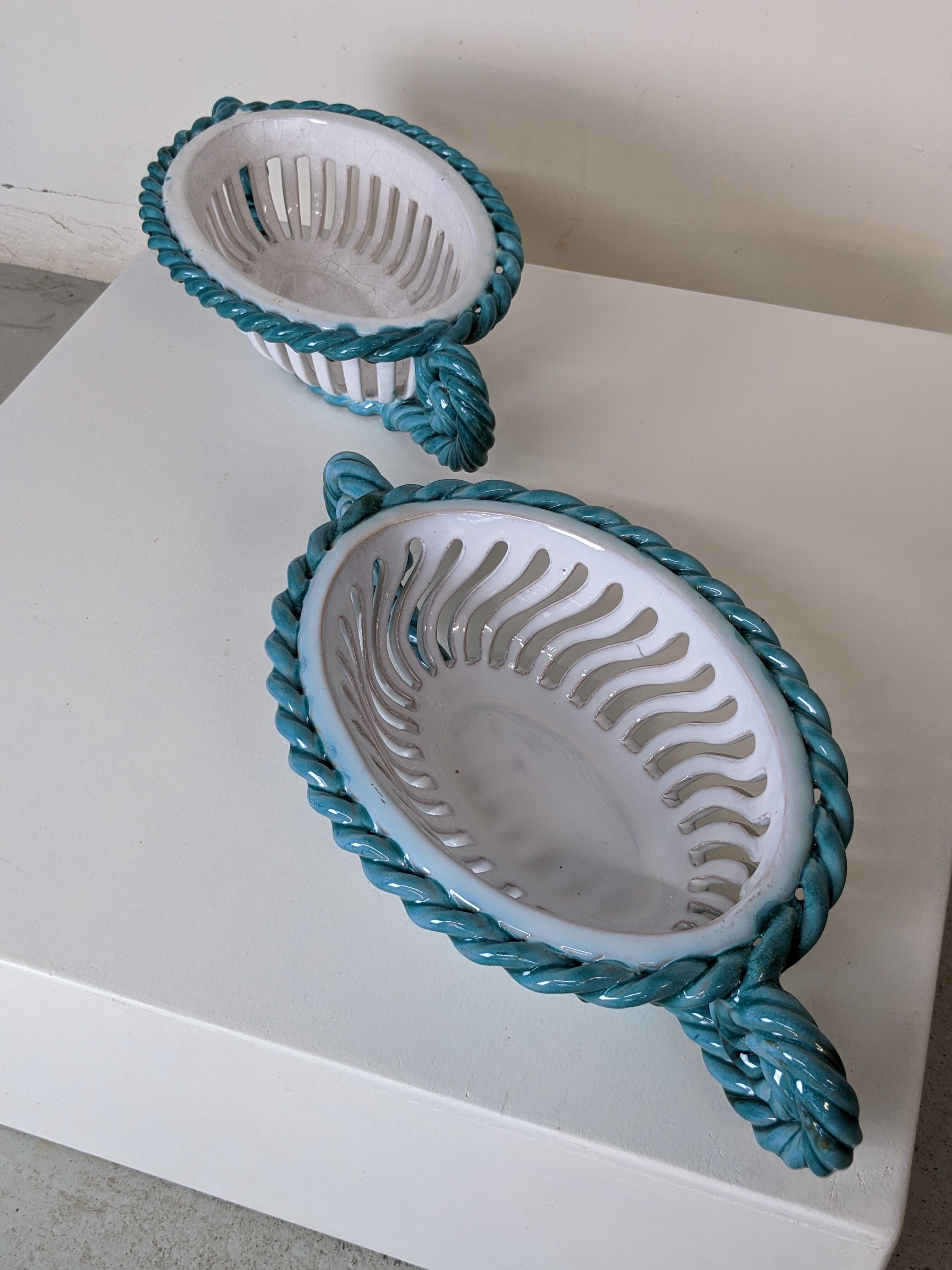 Set of 2 twisted earthenware fruit baskets by Sainte Radegonde, 50s