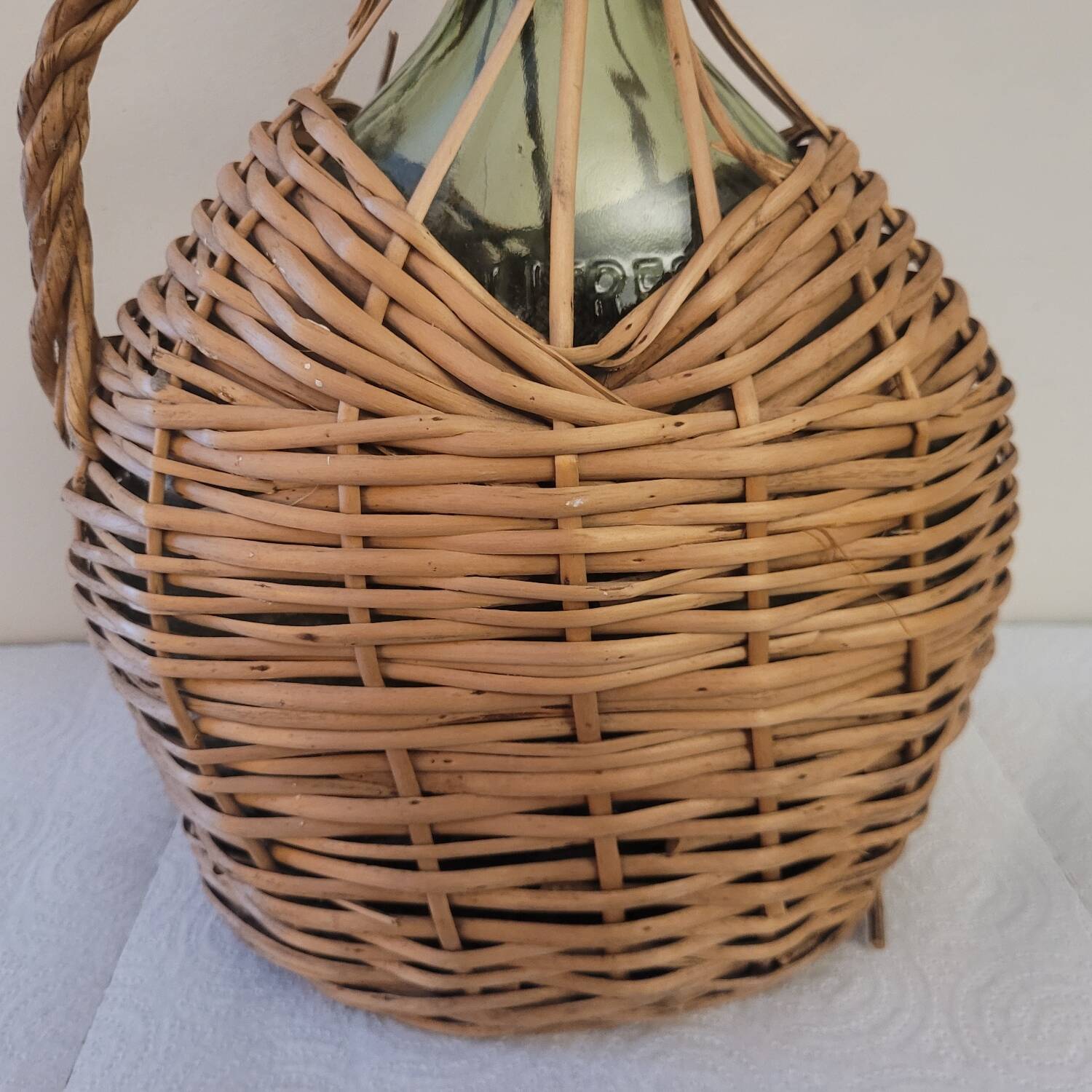 Green glass carafe with wicker covering – 2 litres – 1960s–1970s