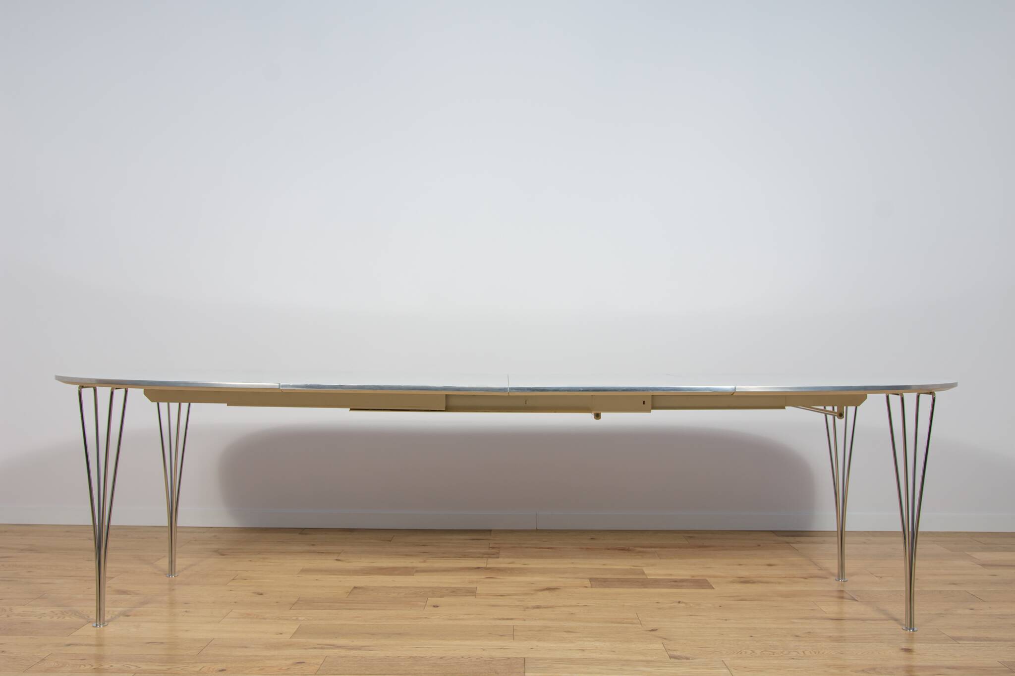 Mid Century Modern Extendable Ellipse B612 Dining Table by Piet Hein & Brun