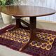 Oval GPlan table in mahogany from the 1970s with a butterfly extension.