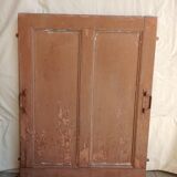Old glazed door with its shutter