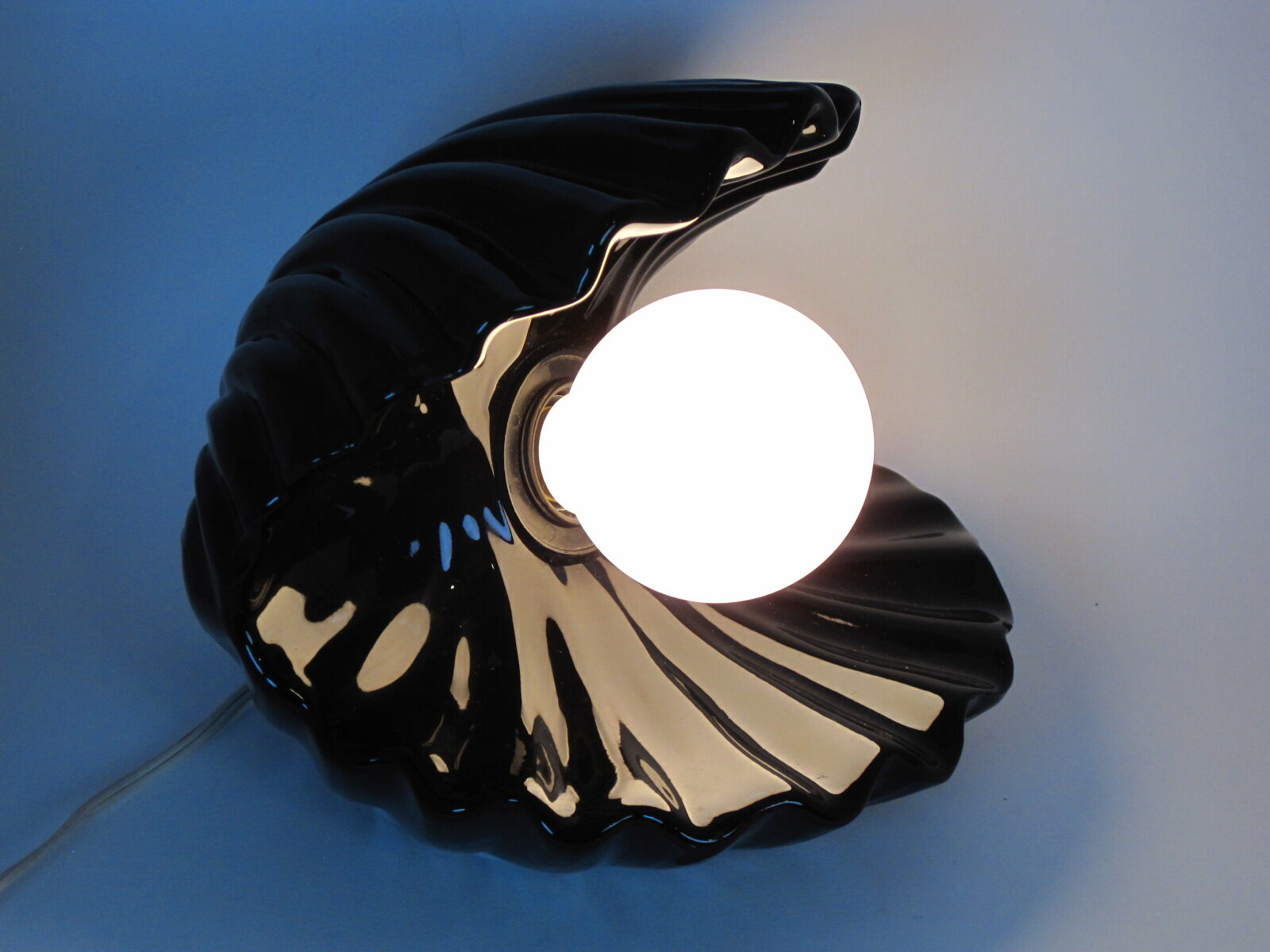 Vintage shell table lamp in black enamel ceramics design seventies 1970