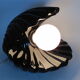 Vintage shell table lamp in black enamel ceramics design seventies 1970