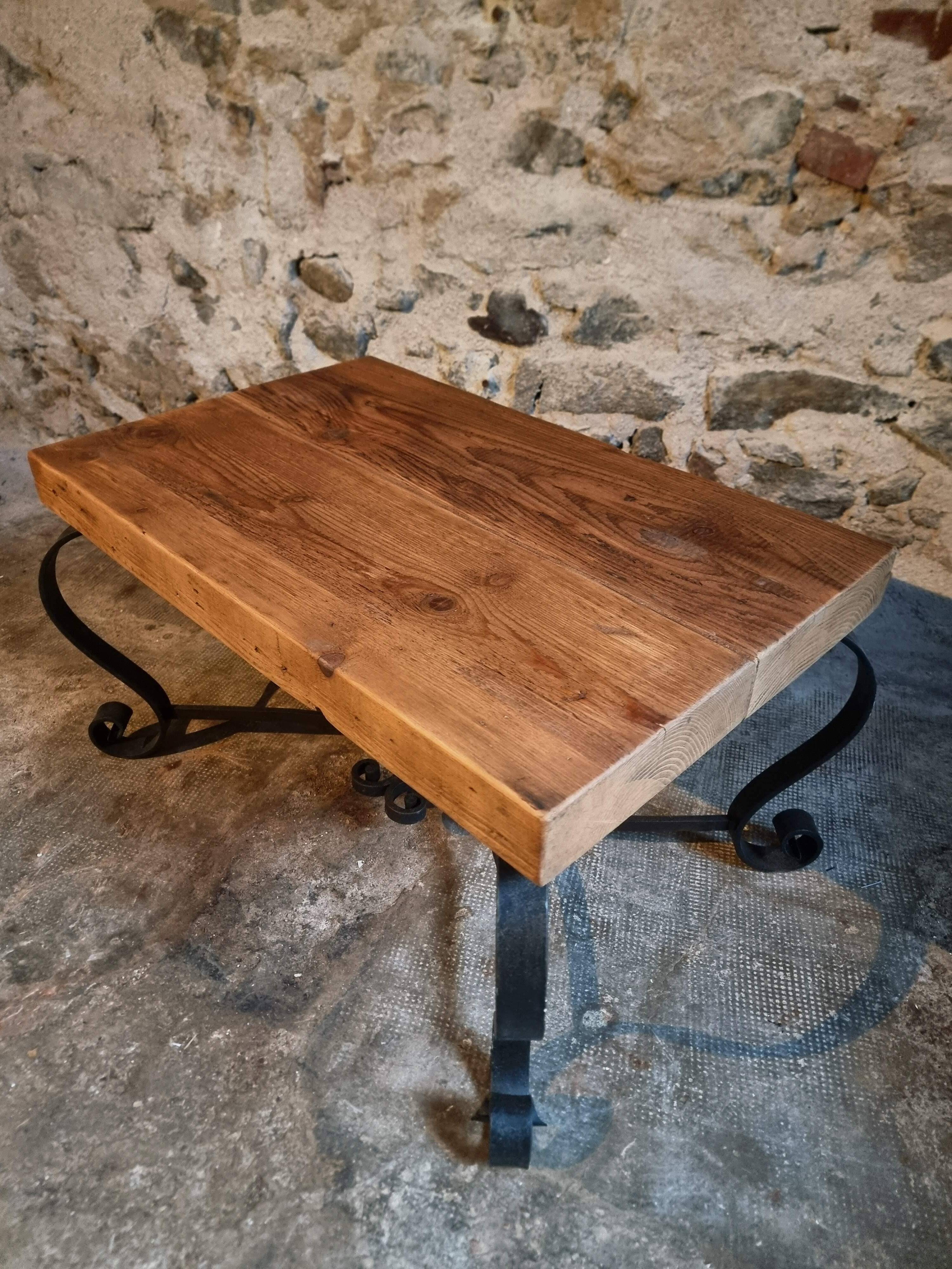 Vintage French coffee table from the 1960s – Rustic pine coffee table with a black iron base.