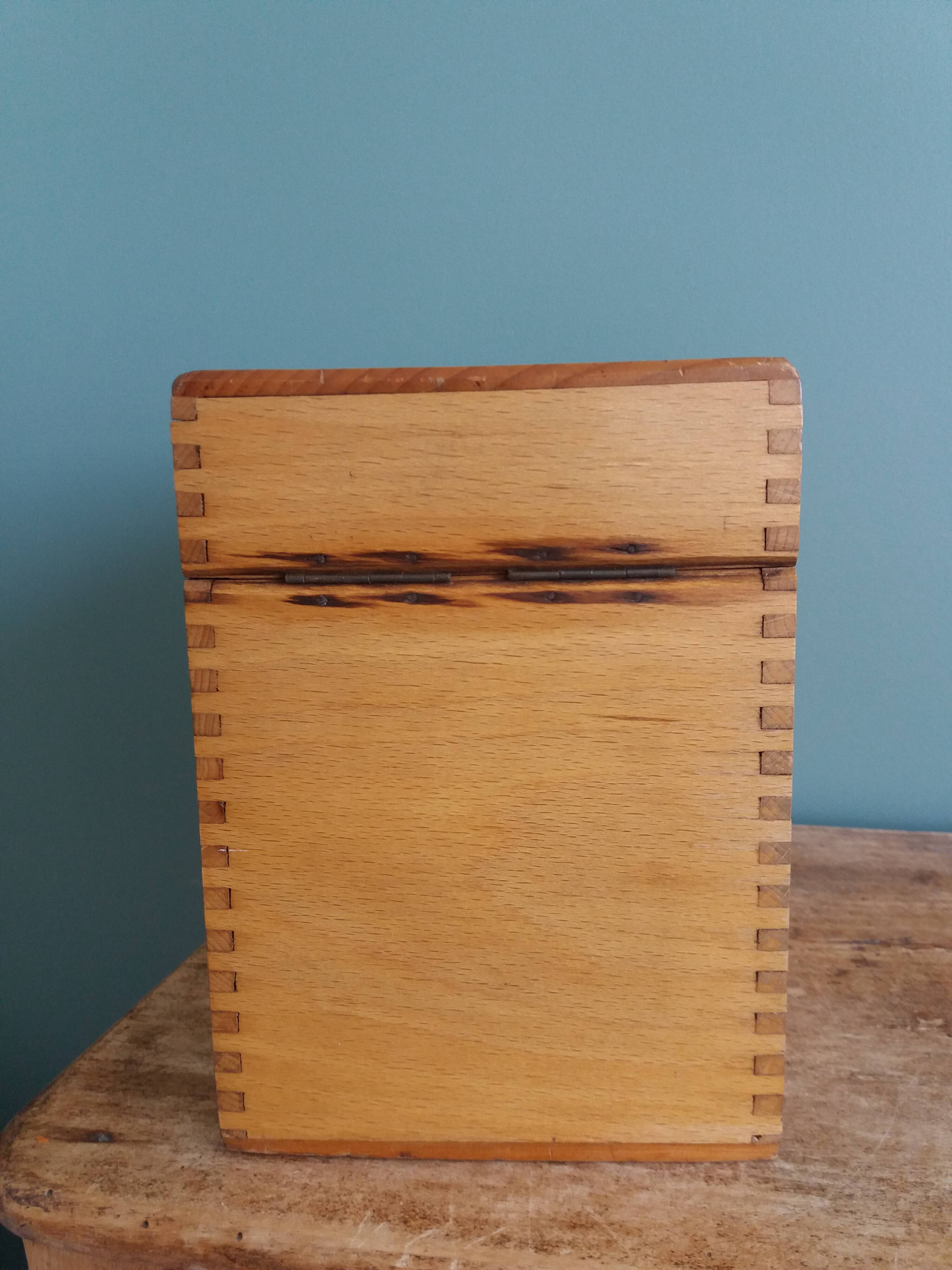 Wooden storage box, empty pocket
