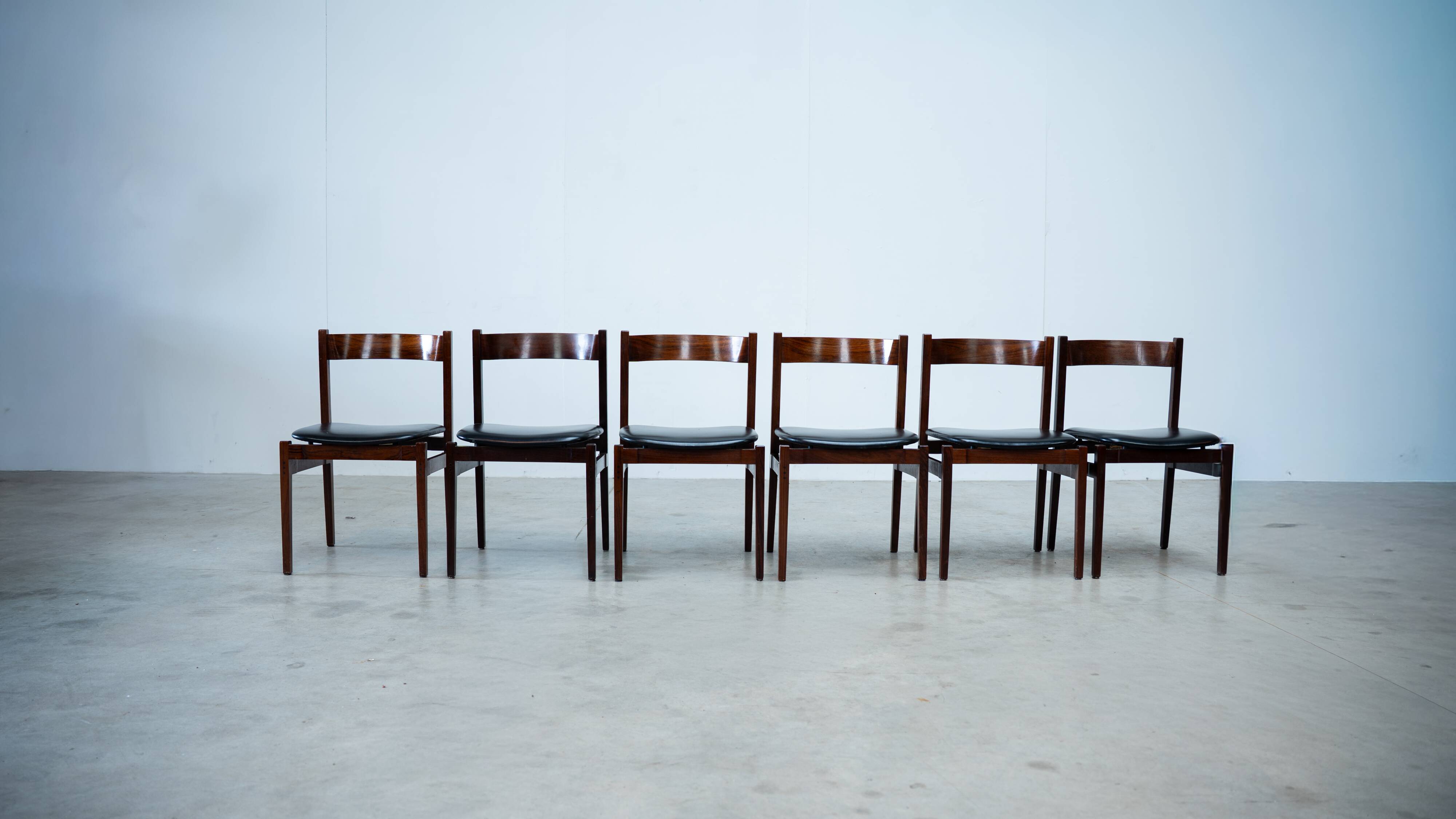 Set of six model 101 rosewood dining chairs by Gianfranco Frattini