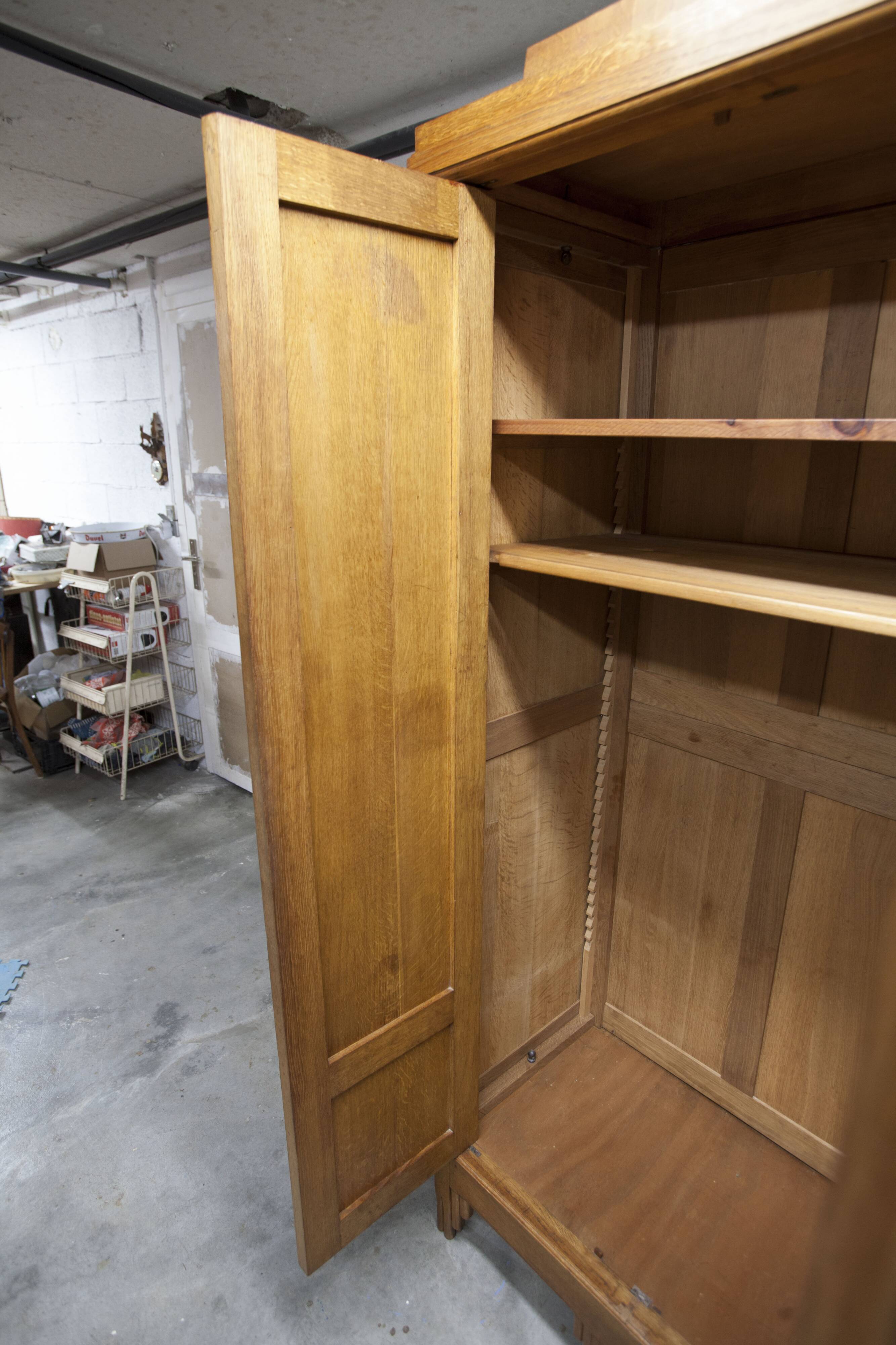 Art Deco carved oak wardrobe - Flemish workshop circa 1930