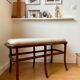 Wooden and beige cotton piano bench