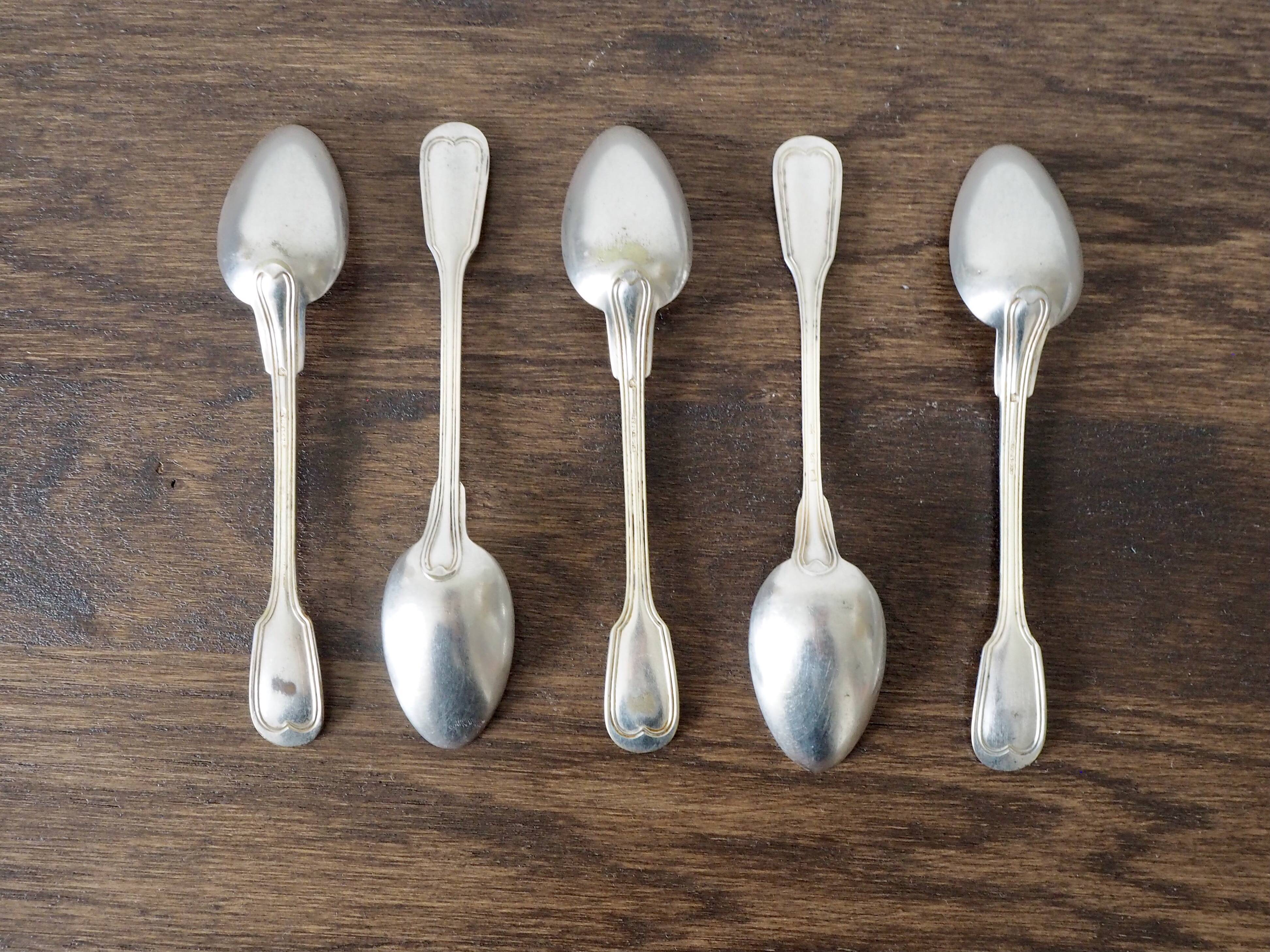 Set of 5 white metal spoons from the 20s