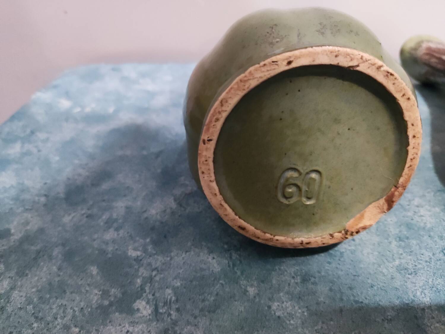 Two enameled stoneware pitchers