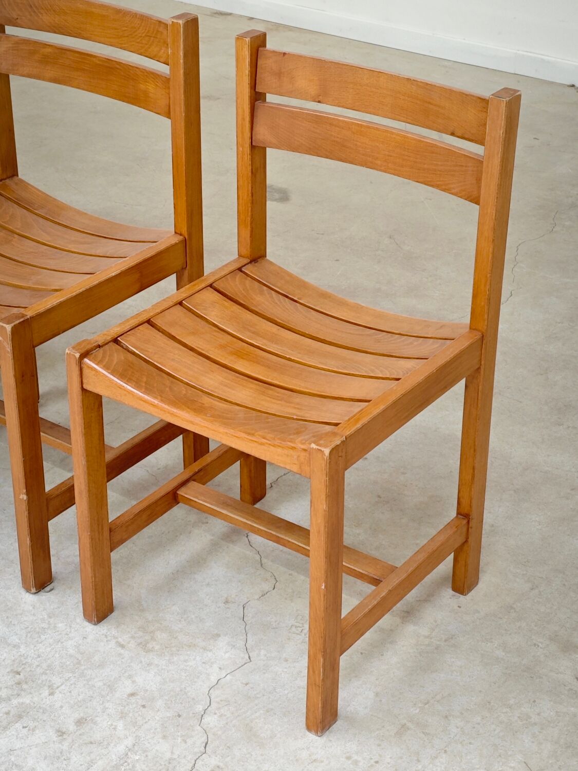 Set of 4 wooden chairs by André Sornay