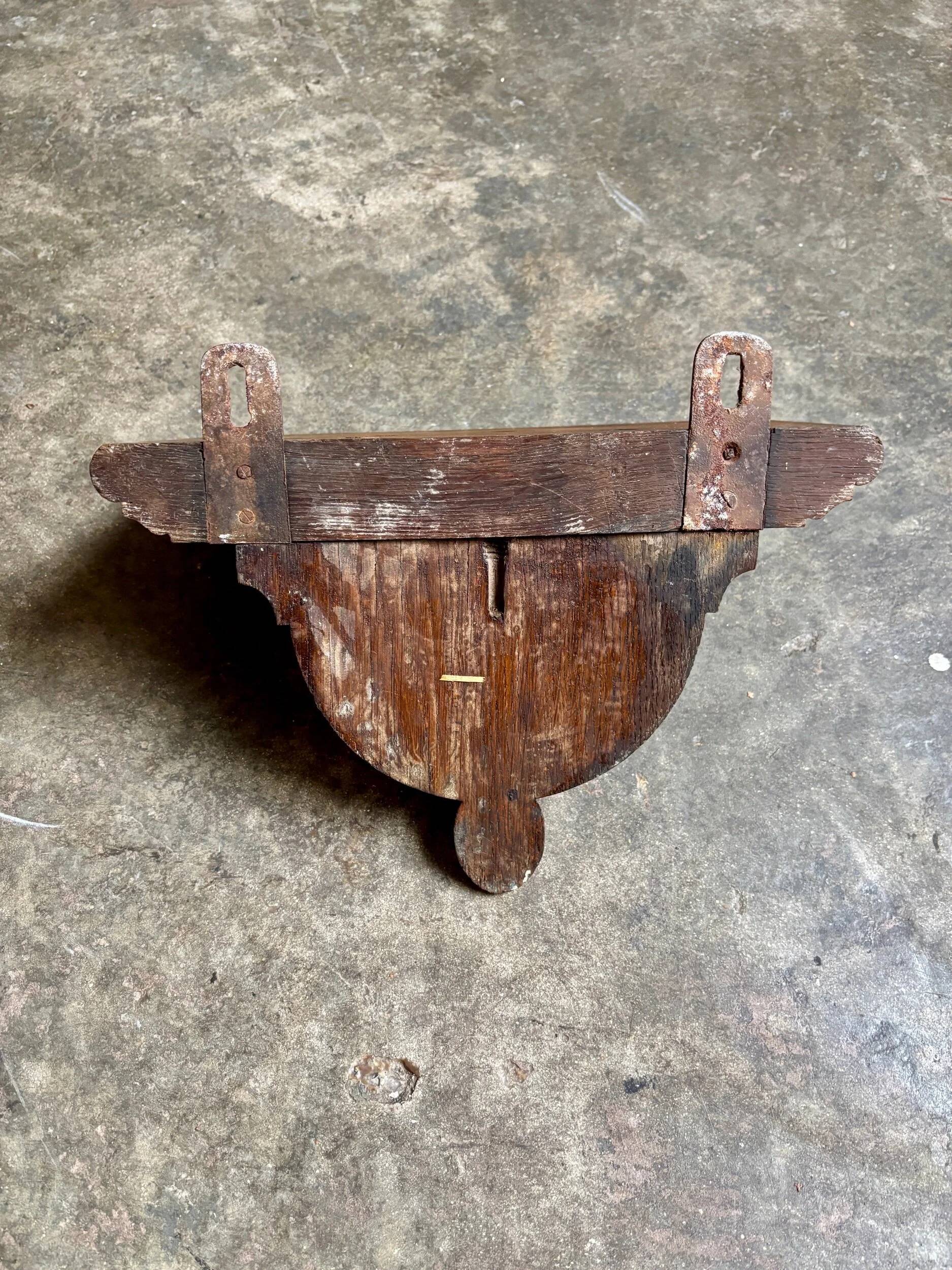 Dark wood wall shelf