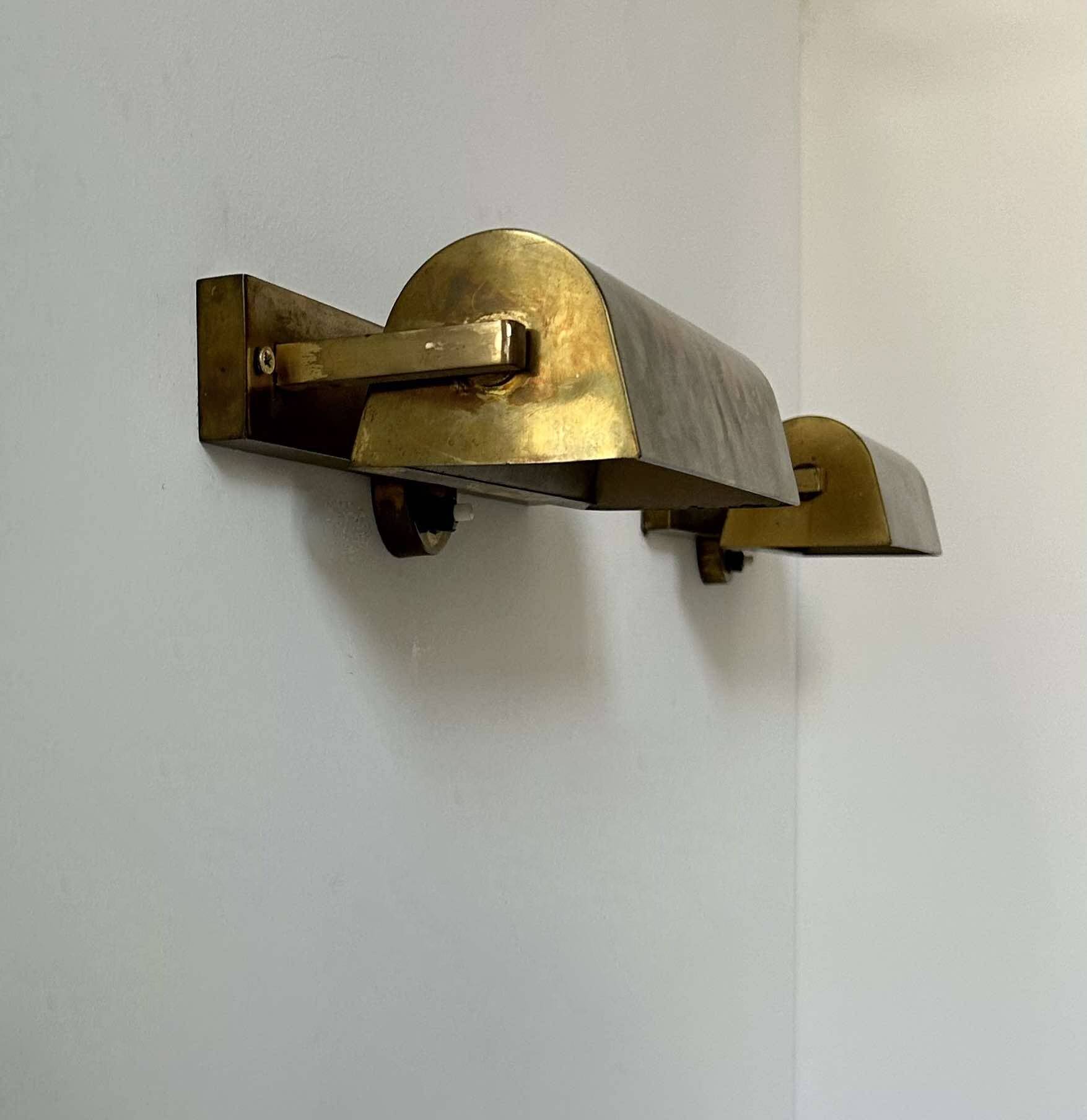Pair of vintage modernist wall lights, adjustable in brass, France 1940