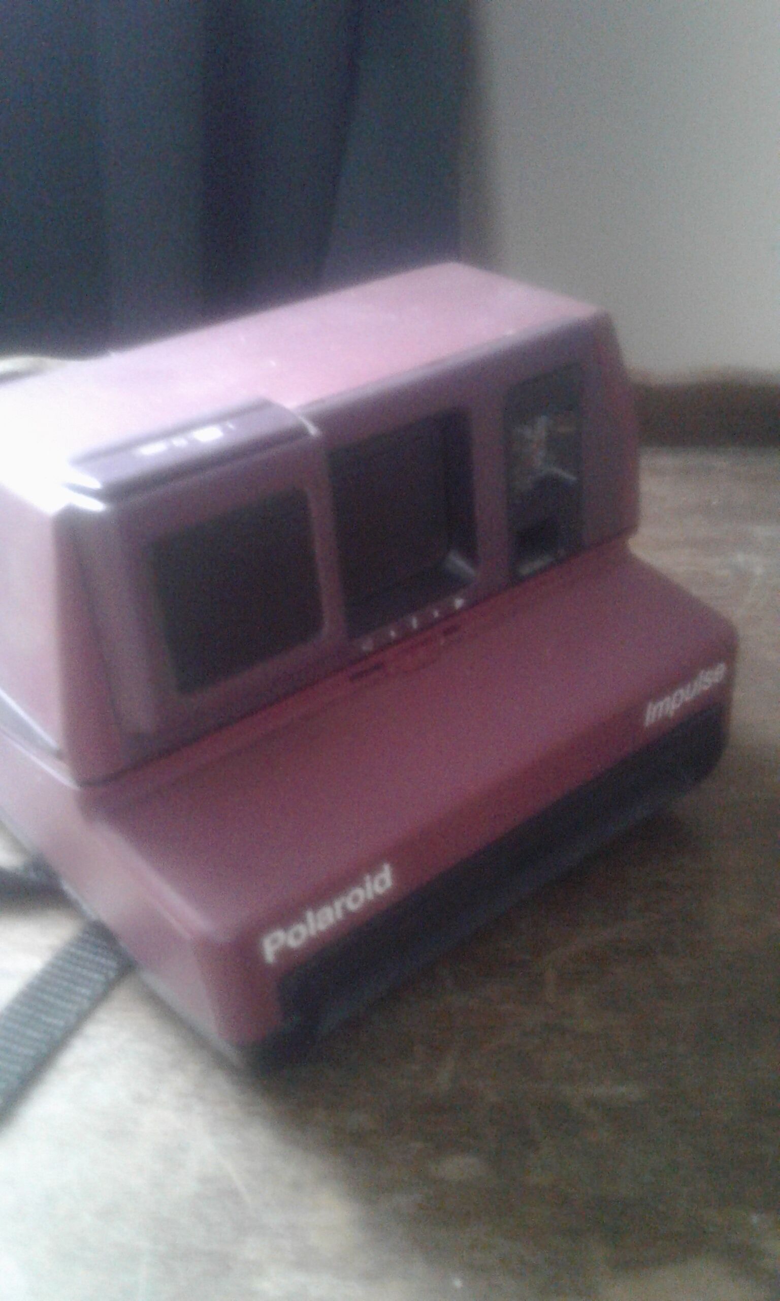 Instant impulse polaroid camera