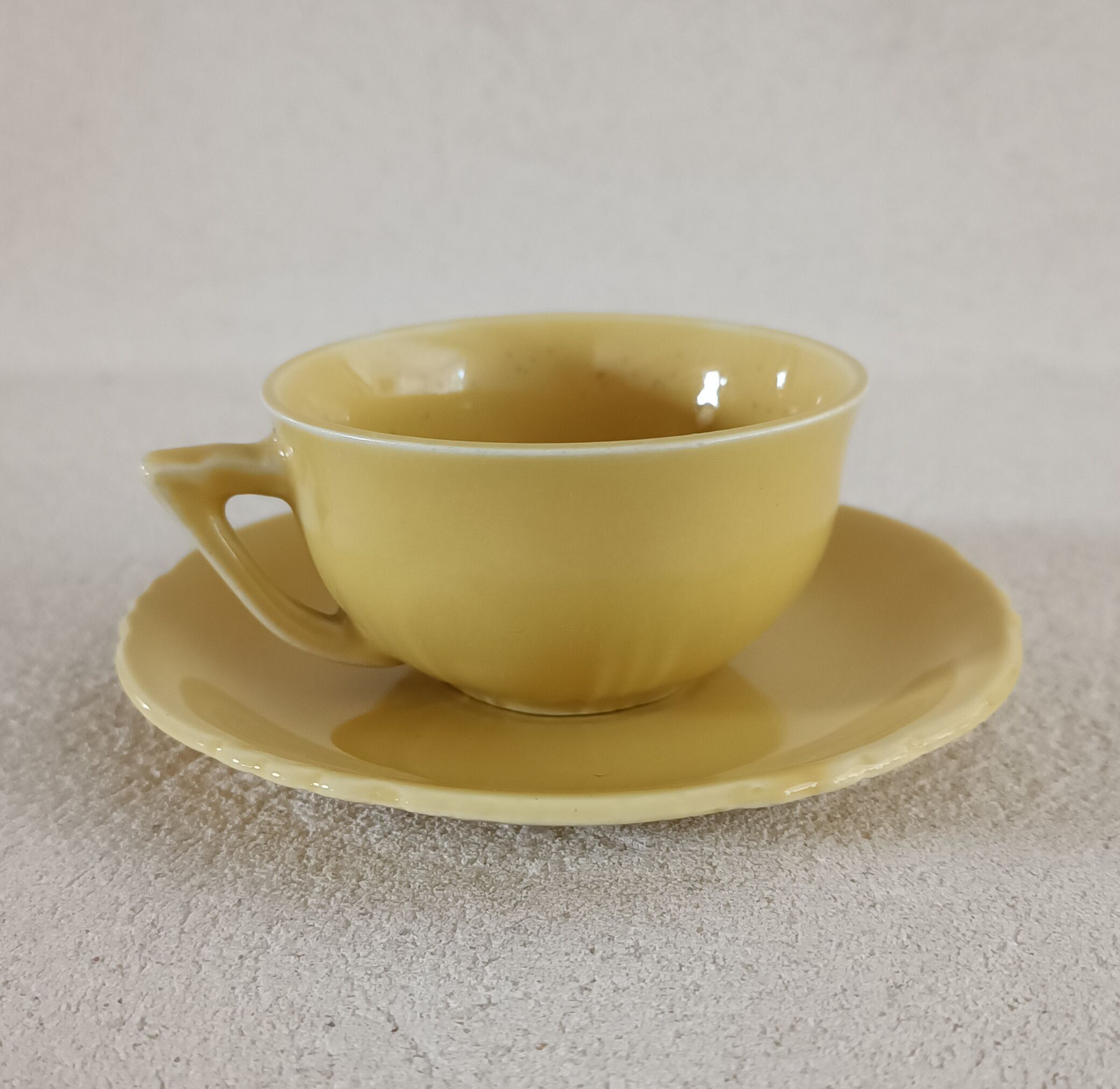 Earthenware cup and saucer 1940s-1950s
