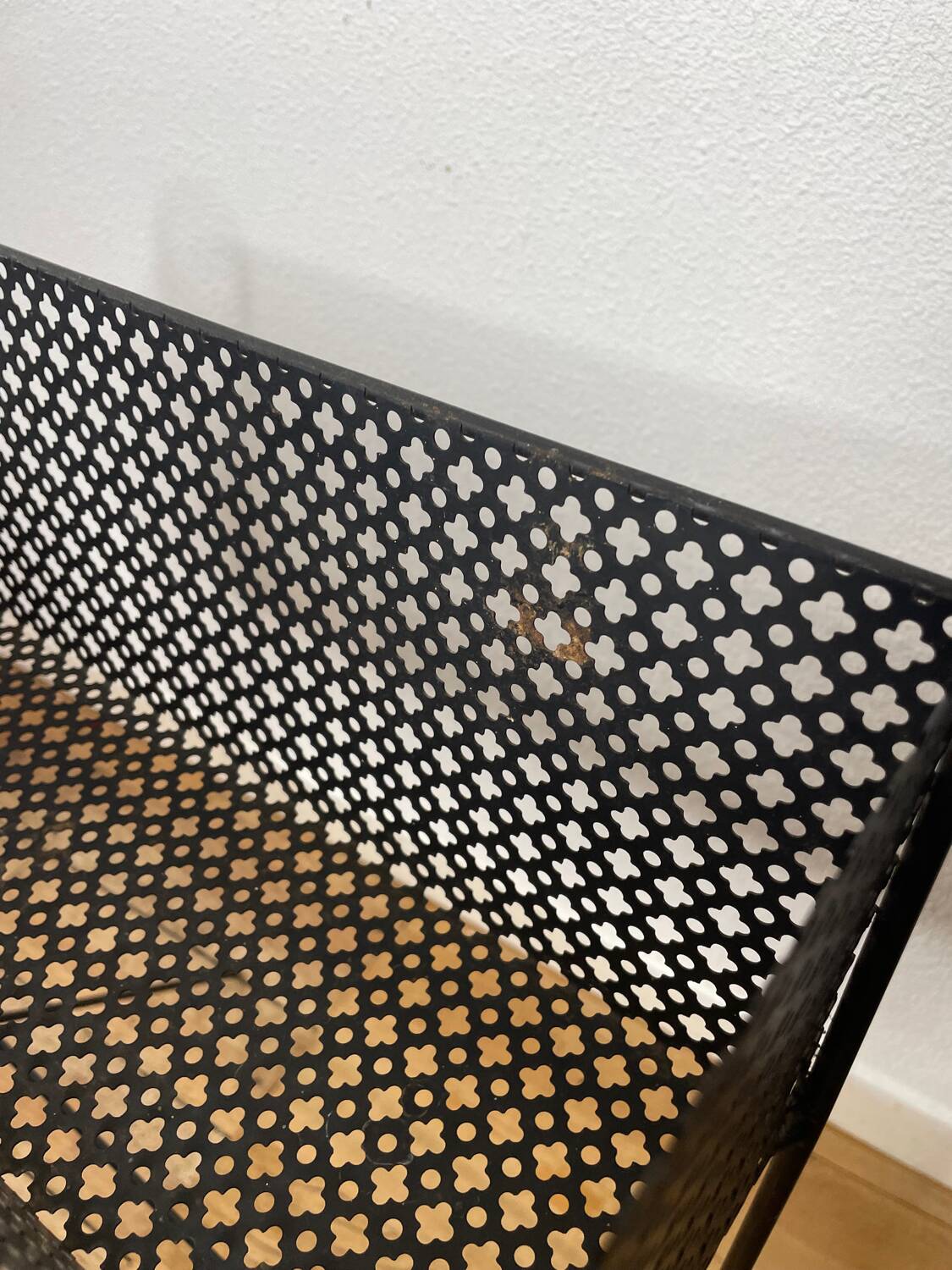 1950s black perforated metal planter in the style of Mathieu MATEGOT